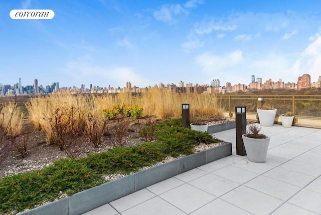 view of patio / terrace featuring a view of city