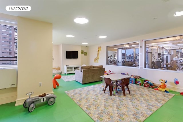 rec room featuring recessed lighting, visible vents, baseboards, and tile patterned floors