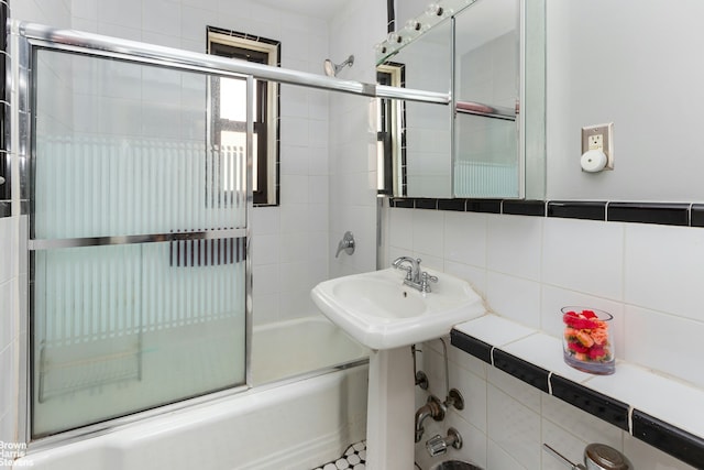 3840 Greystone Ave Unit 2O, New York City, NY 10463 - bathroom featuring enclosed tub / shower combo and backsplash