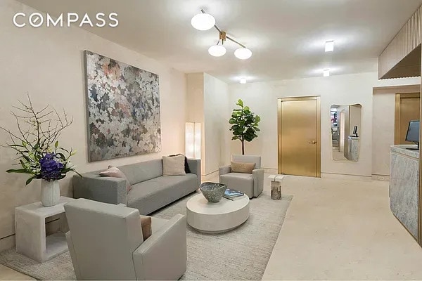 living area with concrete flooring