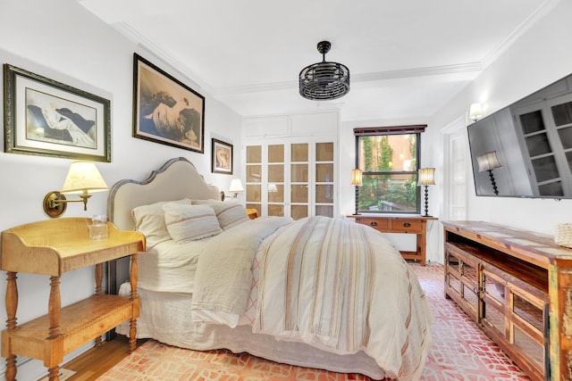 bedroom with crown molding