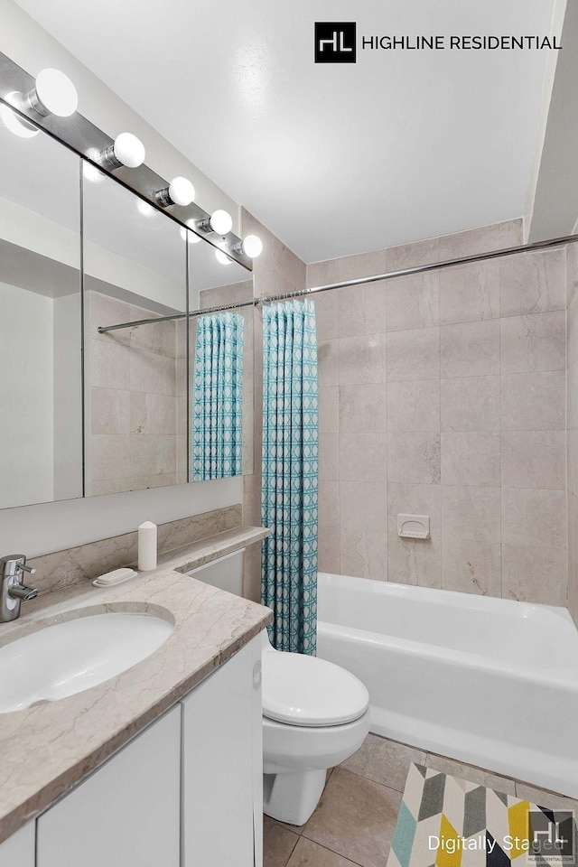 250 E 40th St Unit 4A, New York City, NY 10016 - bathroom featuring tile patterned floors, toilet, shower / bath combo with shower curtain, and vanity
