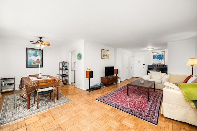 living room with a ceiling fan