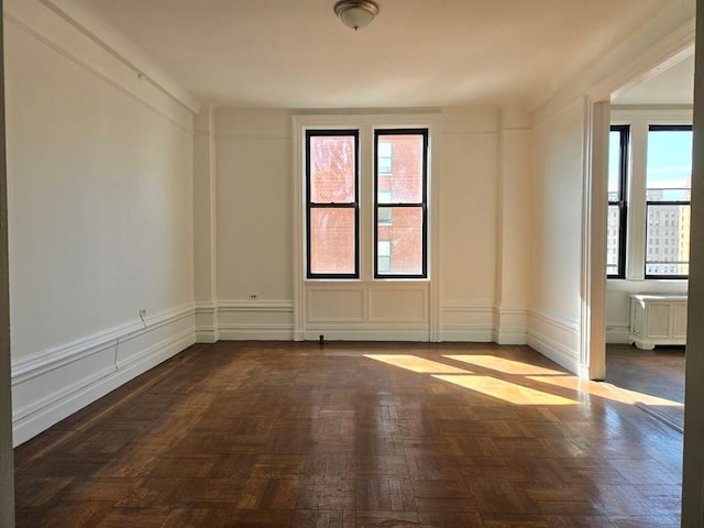 empty room featuring a decorative wall