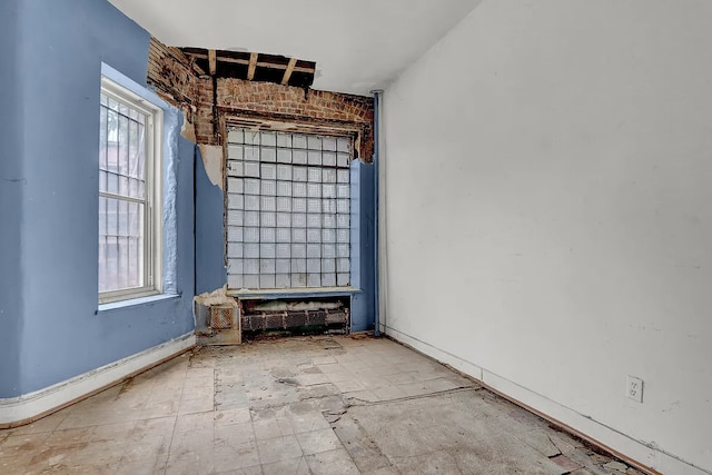 spare room with a healthy amount of sunlight