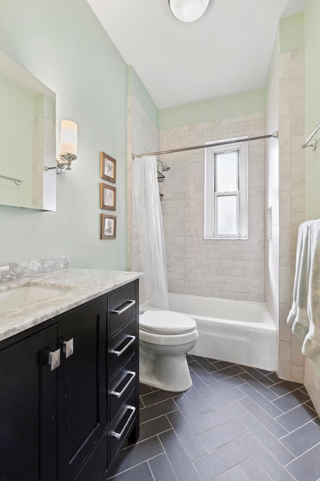 bathroom with toilet, tile patterned floors, shower / bath combo, and vanity