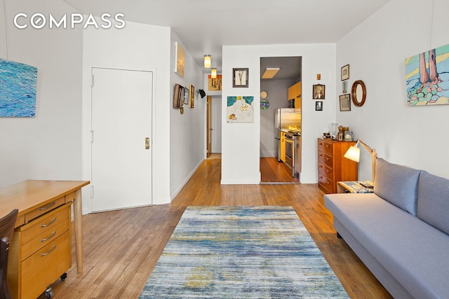 living area featuring wood finished floors