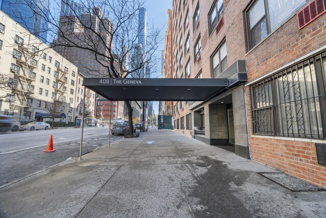 408 W 57th St Unit 6G, New York City, NY 10019 - view of road featuring sidewalks and street lights