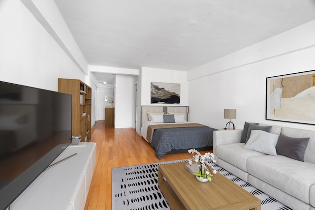 bedroom with light wood-type flooring