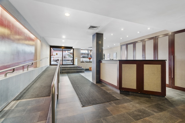 welcome area featuring recessed lighting