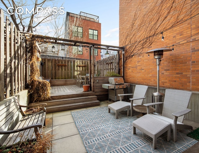 view of patio with a grill