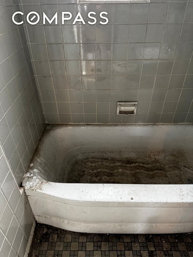 bathroom with a bathing tub