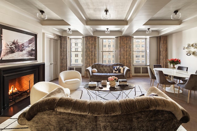 living area with a lit fireplace