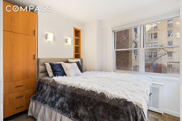 bedroom with visible vents