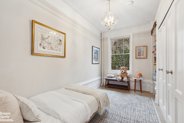 37 W 93rd St Unit 17/13, New York City, NY 10025 - bedroom with a chandelier and ornamental molding