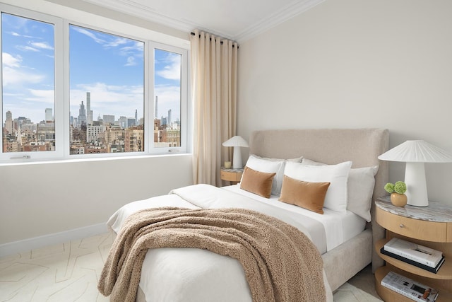 bedroom featuring crown molding, baseboards, a city view, and carpet flooring