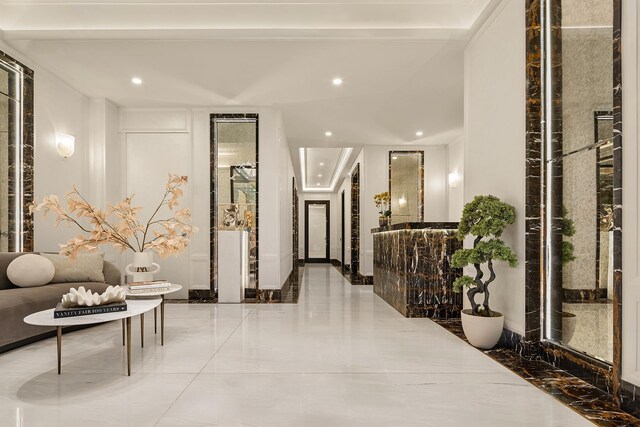 126 E 86th St Unit 17A, New York City, NY 10028 - hall featuring recessed lighting and marble finish floor