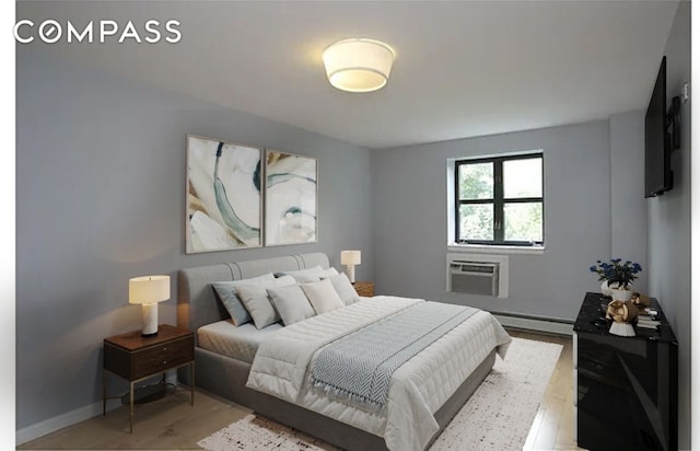 bedroom featuring a baseboard heating unit, a wall mounted air conditioner, light wood-style flooring, and baseboards