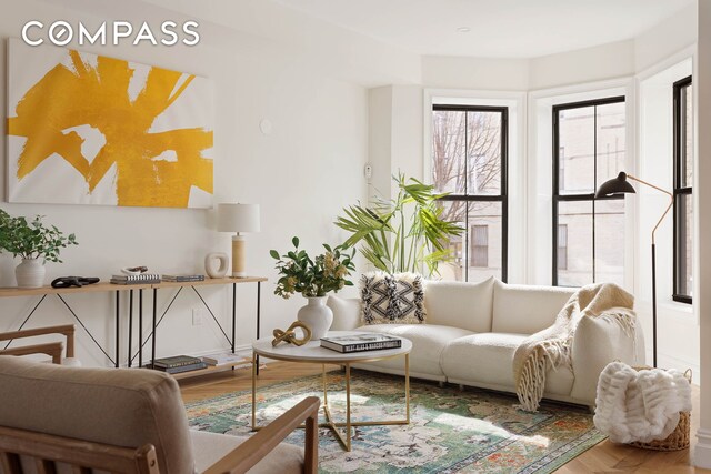 living room with parquet flooring