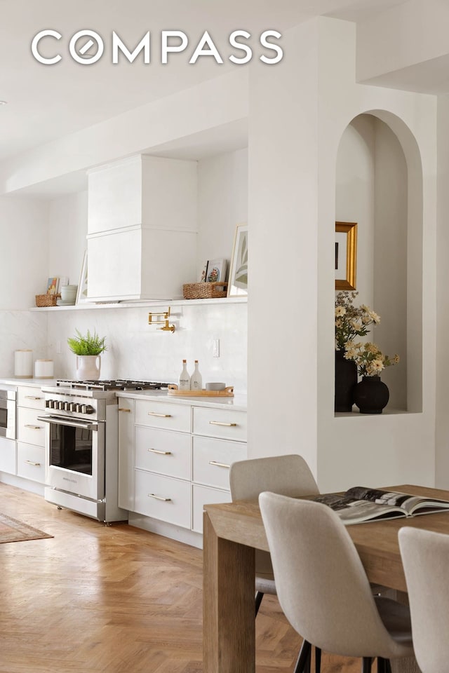 bar with appliances with stainless steel finishes and decorative backsplash