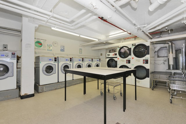 34-40 78th St Unit 4H, New York City, NY 11372 - shared laundry area with stacked washer and clothes dryer, separate washer and dryer, and tile patterned floors