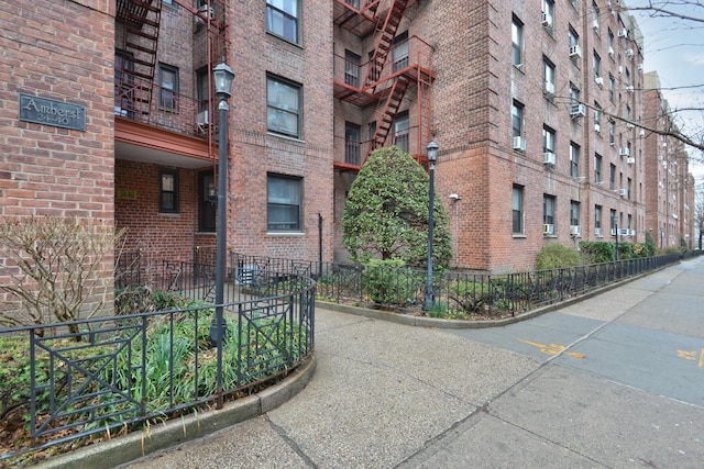 view of property with fence