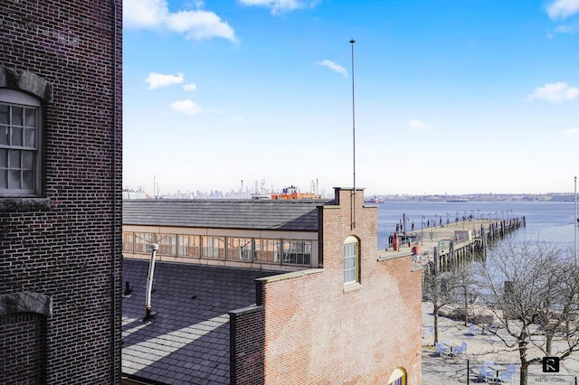 exterior space with a water view