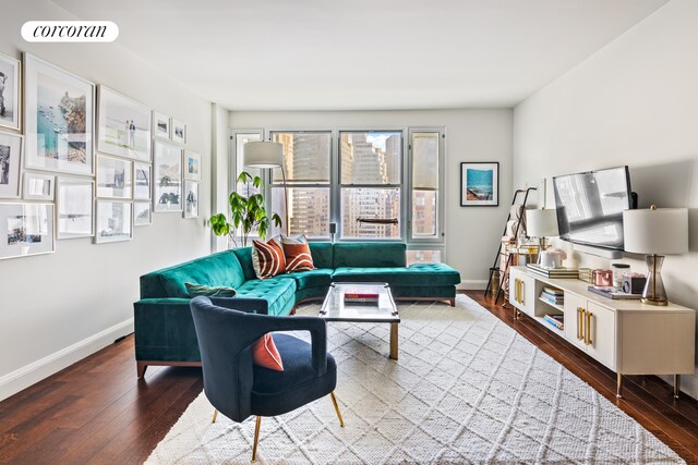 70 Little W St Unit 22G, New York City, NY 10280 - living room with wood-type flooring and baseboards