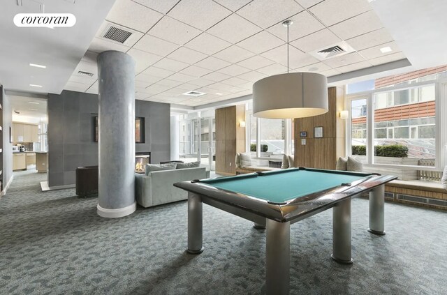 70 Little W St Unit 22G, New York City, NY 10280 - playroom featuring carpet floors, a glass covered fireplace, a drop ceiling, and billiards