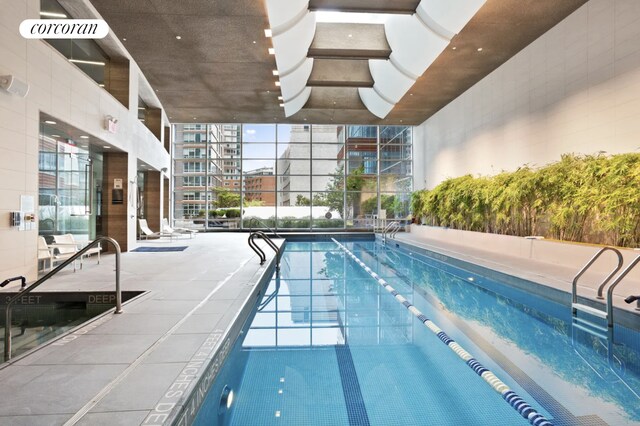 70 Little W St Unit 22G, New York City, NY 10280 - indoor community pool with a patio area