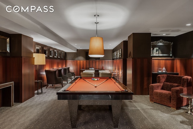 playroom with wooden walls, billiards, a community bar, carpet, and wainscoting