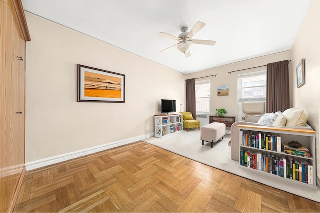 161 E 88th St Unit 6C, New York City, NY 10128 - sitting room with ceiling fan and baseboards