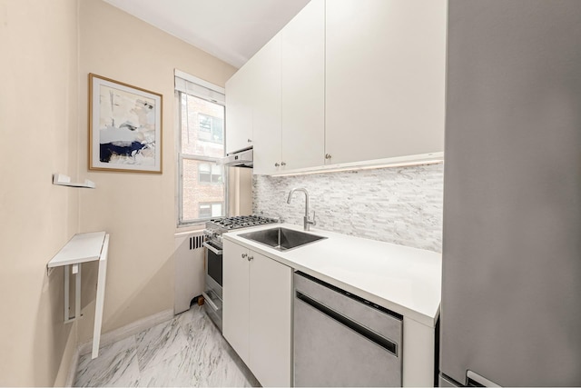 161 E 88th St Unit 6C, New York City, NY 10128 - kitchen featuring a sink, white cabinetry, light countertops, stainless steel appliances, and light marble finish flooring