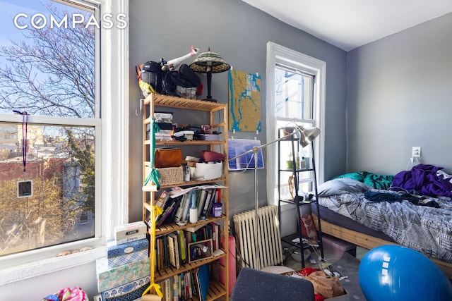 bedroom with radiator heating unit