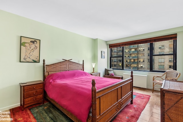 bedroom featuring baseboards