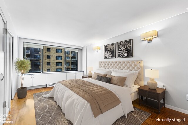 305 E 40th St Unit 17Jk, New York City, NY 10017 - bedroom with baseboards