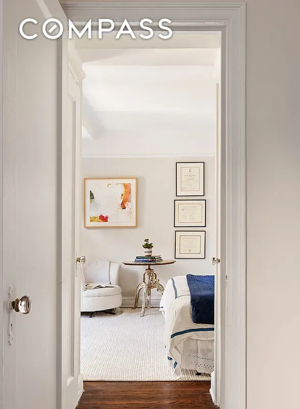151 E 83rd St Unit 5E, New York City, NY 10028 - hall featuring wood finished floors