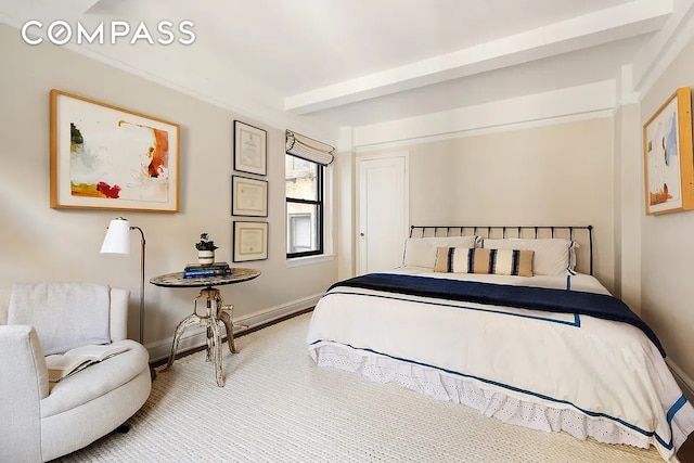 151 E 83rd St Unit 5E, New York City, NY 10028 - bedroom featuring baseboards and beam ceiling