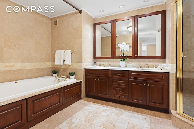 bathroom with a sink, visible vents, tile walls, a bath, and a stall shower