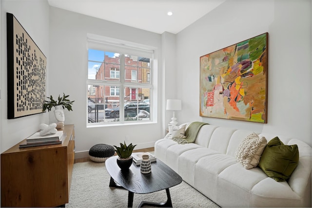 living room with recessed lighting, wood finished floors, and baseboards