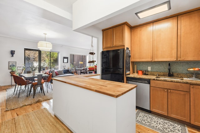 69 E 130th St Unit 1C, New York City, NY 10037 - kitchen with freestanding refrigerator, wooden counters, light wood-type flooring, a sink, and dishwasher