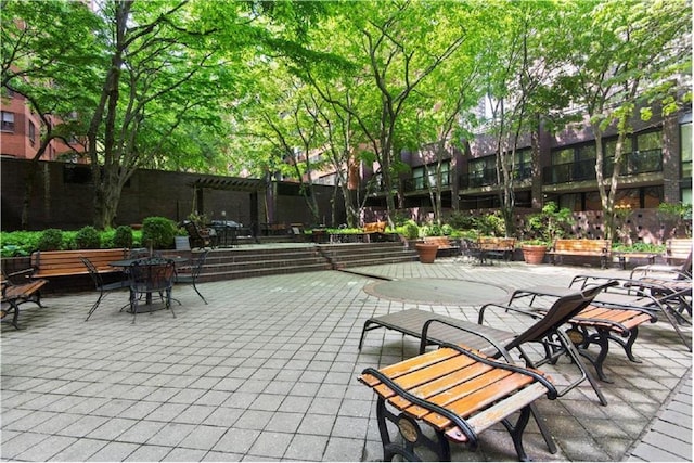 view of patio featuring a pergola