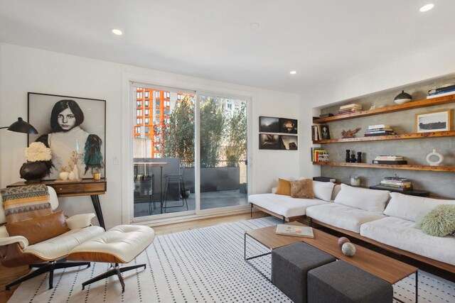 living room featuring wood finished floors and recessed lighting