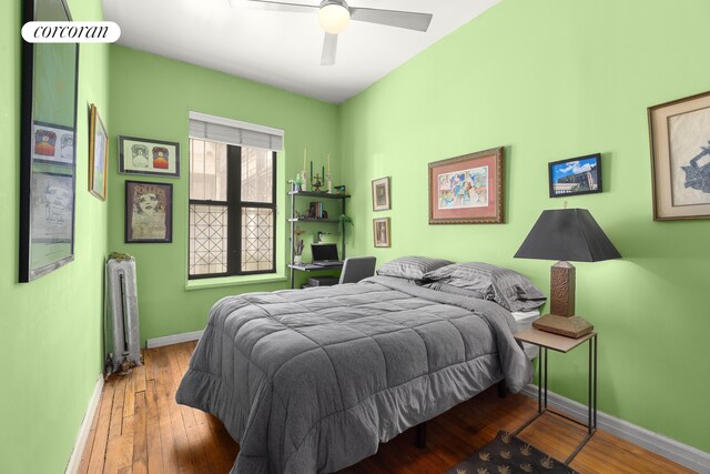 69 Tiemann Pl Unit 12, New York City, NY 10027 - bedroom featuring radiator heating unit, hardwood / wood-style flooring, and ceiling fan