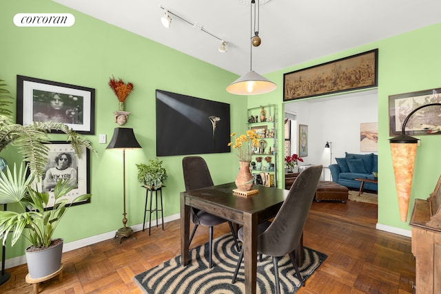 69 Tiemann Pl Unit 12, New York City, NY 10027 - dining space featuring baseboards and rail lighting