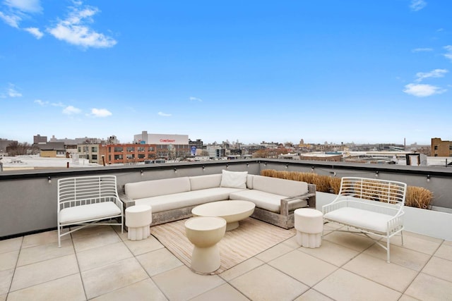 view of patio / terrace with a balcony and an outdoor living space