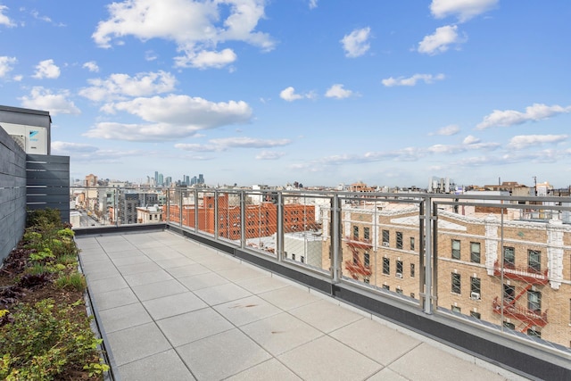 balcony featuring a city view