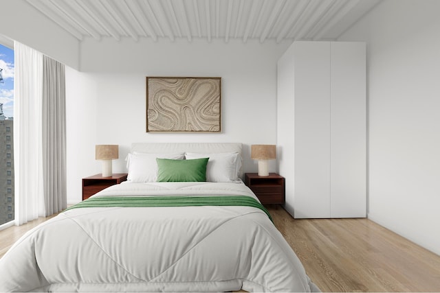 bedroom with light wood-style flooring