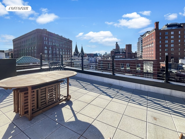 260 W 10th St Unit 2W, New York City, NY 10014 - view of patio / terrace featuring a view of city, a balcony, and outdoor dining space
