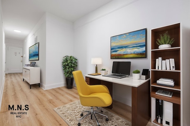 office space featuring light wood-style floors and baseboards